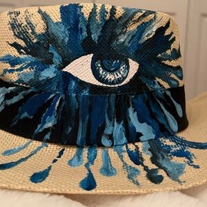 Accessorize Blue and Tan Eye Design Hat